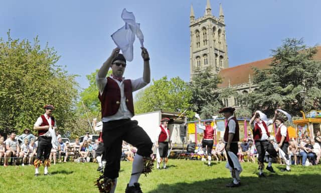 Bright sunshine greets fayre goers at the St Mary's Church Fayre in Portsmouth. Morris Men. Picture Ian Hargreaves  (180471-09)