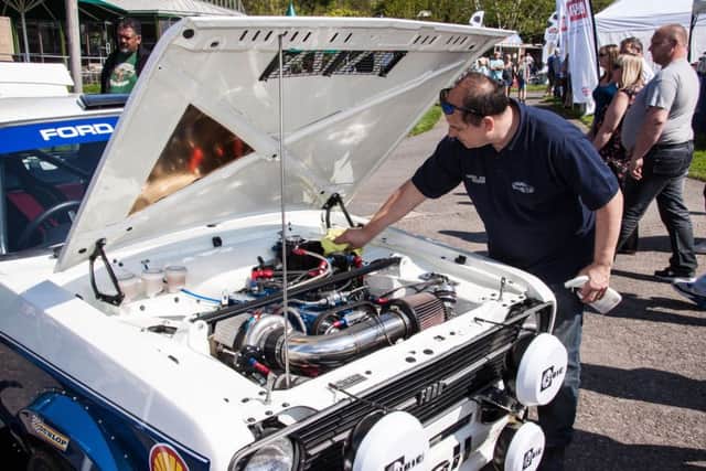People's choice winner Martin Lewis polishes his Escort RS2000