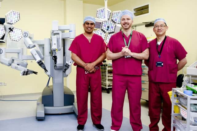 Jim Khan, consultant surgeon; Mark Cubbon, QA's chief executive and Simon Toh, upper GI surgeon. Picture: Martyn Roberts  clinical photographer