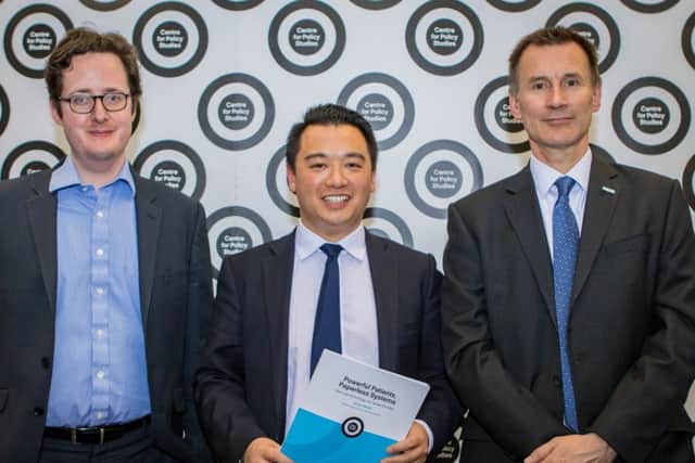 Alan Mak MP, centre, Centre for Policy Studies director Robert Colvile, left, and with Jeremy Hunt, right
