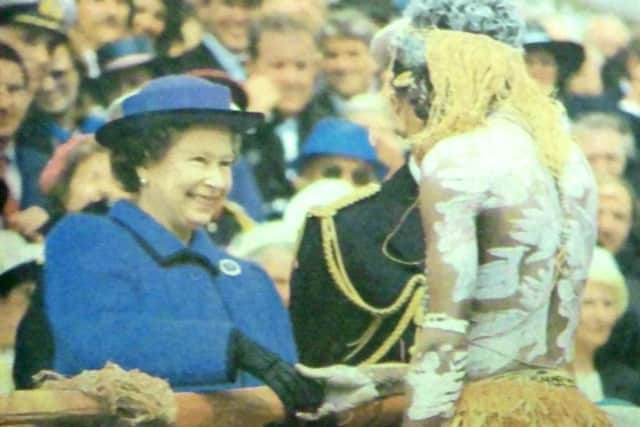 Retro 12 may 2018Bararroga - The Queen accepts the gift of mimi stick from one of the Aboriginal dancers