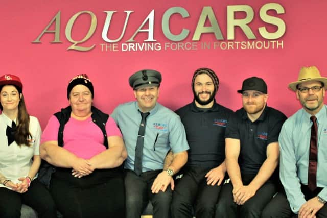 Staff at Aquacars raising money for Brain Tumour Research