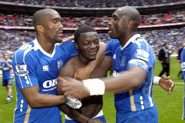 Sylvain Distin, Sulley Muntari and Sol Campbell celebrate Pompey's FA Cup semi-final win over West Brom in 2008. Picture: Will Caddy