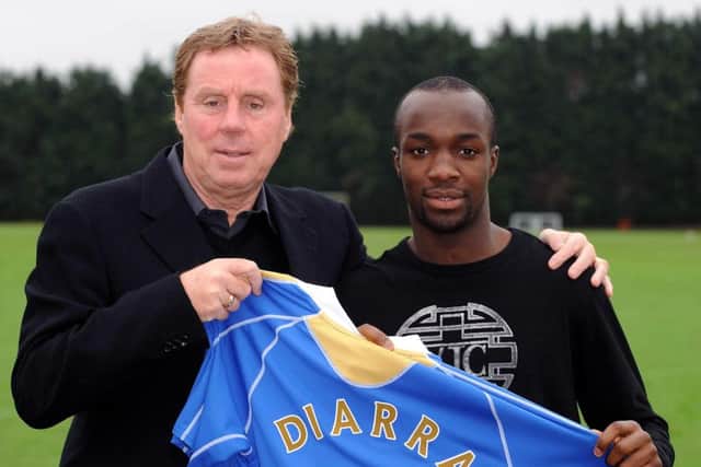 Lassana Diarra with Harry Redknapp after the midfielder signed for Pompey in January 2008. Picture: Robin Jones