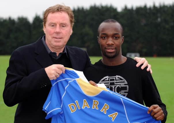 Lassana Diarra with Harry Redknapp after the midfielder signed for Pompey in January 2008. Picture: Robin Jones