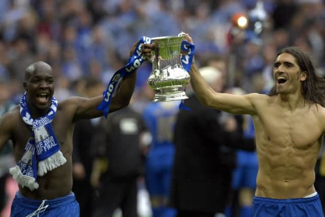 Lassana Diarra and Pedro Mendes parade the FA Cup.  Picture: Will Caddy