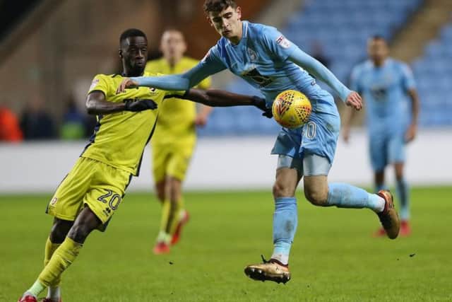 Mo Eisa, left. Picture: Barrington Coombs/ EMPICS Sport