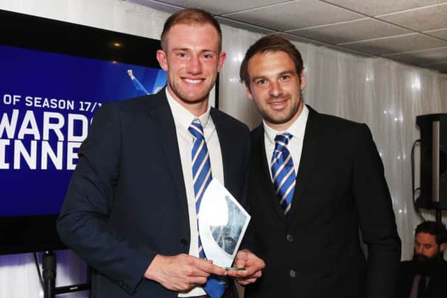 Matt Clarke collects his Players' Player of the Season award from Brett Pitman. Picture: Joe Pepler/ PinPep PPP-180105-223147006