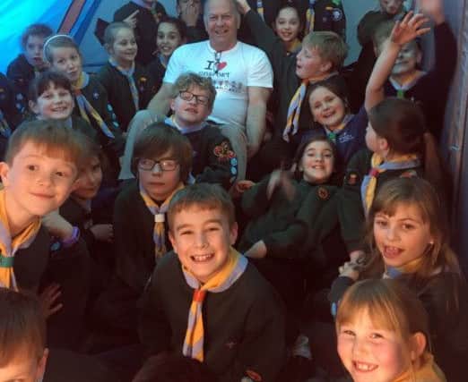 Gosportarian Malcolm Dent with members of the 6th Gosport Scouts. Picture: Supplied