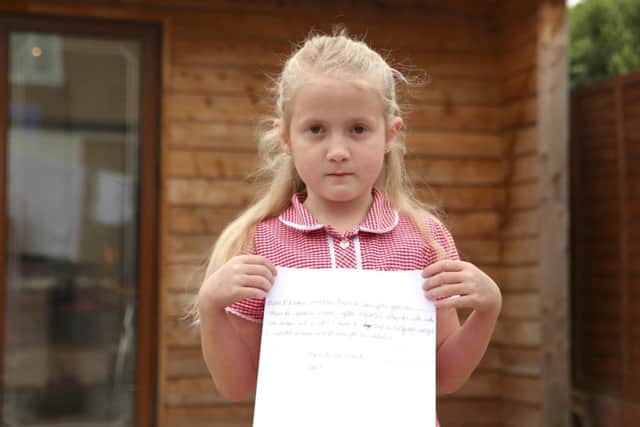 Emma with her letter to the prime minister
