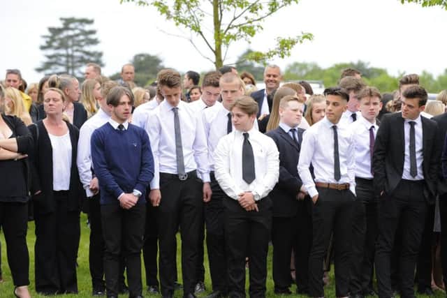 About 300 family and friends attended the funeral.