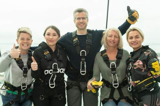 Helen Johnson, Chloe Taylor, Pete Lucas, Jane Gary and Madison Coates at the top of the Spinnaker Tower Picture: Keith Woodland (180288-32)