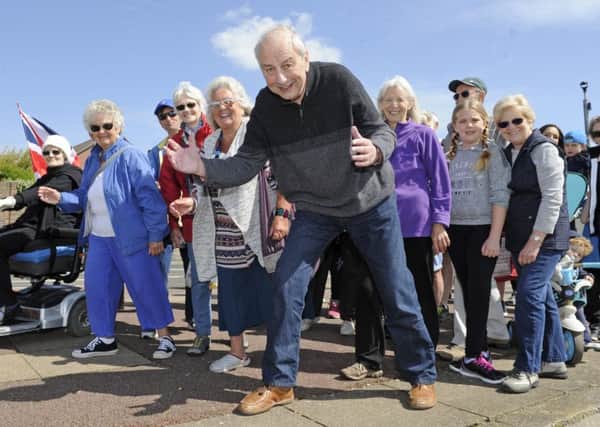 Fundraisers led by the Rocky Appeal's Mick Lyons start a charity walk at Eastney to raise money for Queen Alexandra Hospital.
Picture: Ian Hargreaves (180476-5)