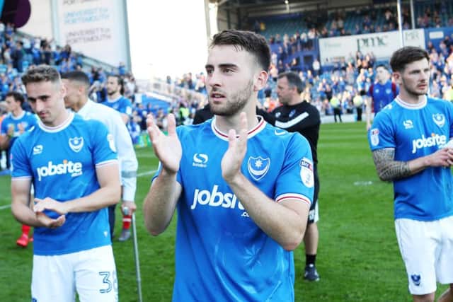 The Pomey players on their lap of appreciation around Fratton Park