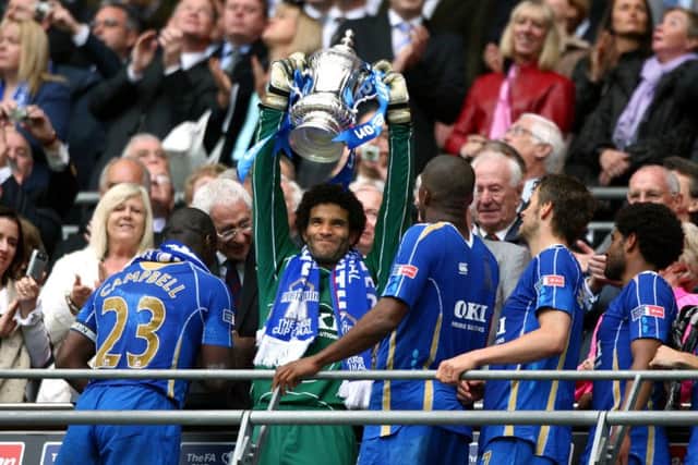 David James lifts the FA Cup following the Blues' victory over Cardiff in 2008