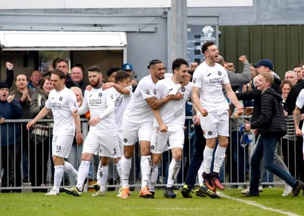 Hawks celebrate with the fans at Westleigh Park. Picture: Neil Marshall