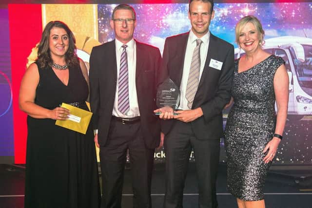 Paul Barringer and Daniel Morton from Lucketts pick up one of several awards at the UK Coach Awards