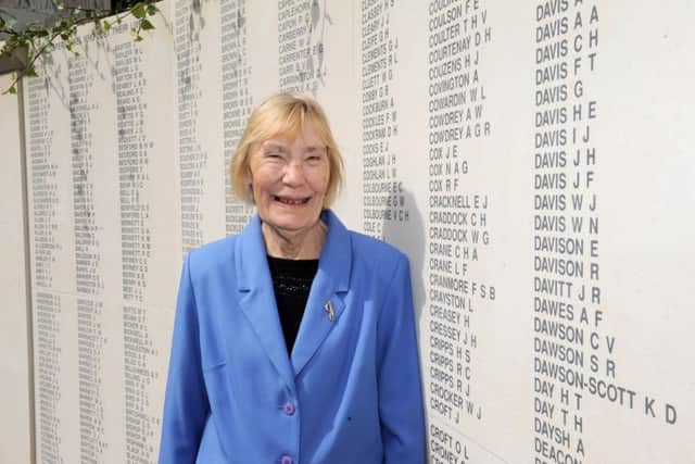 Jean Louth at the Second World War memorial in Guildhall Square