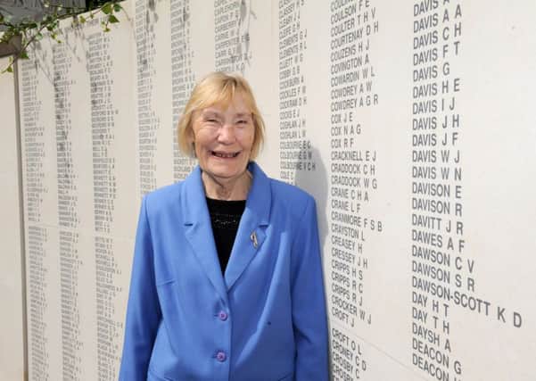 Jean Louth at the Second World War memorial in Guildhall Square