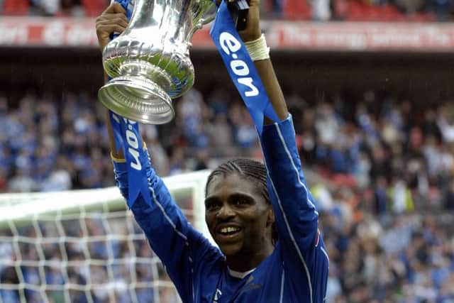 Kanu parades the FA Cup. Picture: Will Caddy
