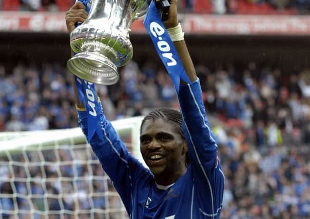 Kanu parades the FA Cup. Picture: Will Caddy