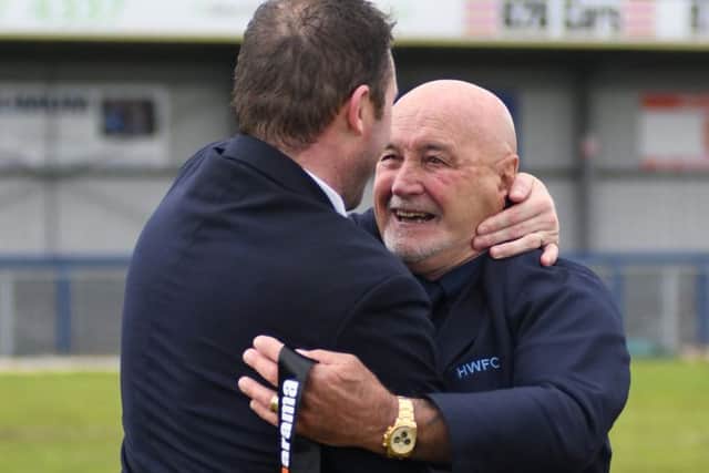 Derek Pope celebrates Hawks' promotion success with Lee Bradbury