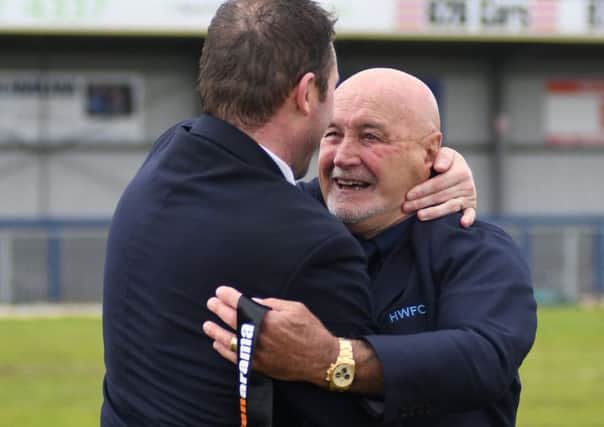 Derek Pope celebrates Hawks' promotion success with Lee Bradbury