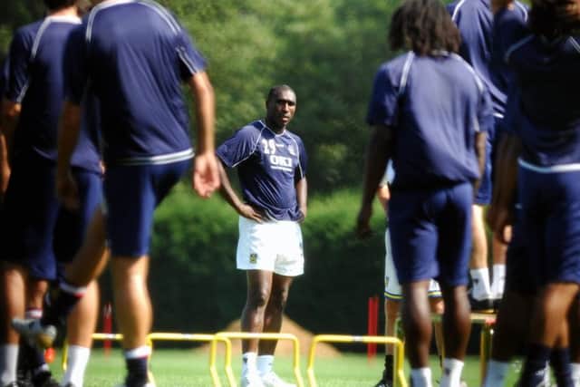 Sol Campbell surveys his new team-mates on his first day of Pompey training. Picture: Steve Reid