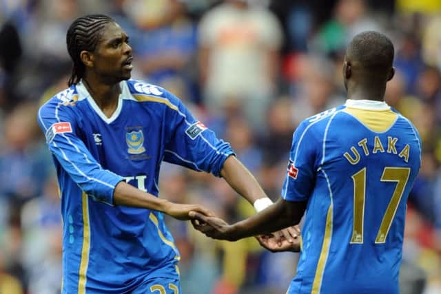 Kanu and John Utaka celebrate the winning goal. Picture: Allan Hutchings