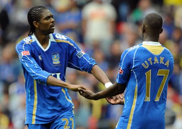 Kanu and John Utaka celebrate the winning goal. Picture: Allan Hutchings
