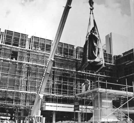 Queen Victorias statue being moved 100 yards to her present position in Guildhall Square in the early 1970s.