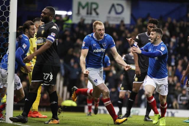 Matt Clarke celebrates scoring from a Gareth Evans delivery against Bury. Picture: Joe Pepler