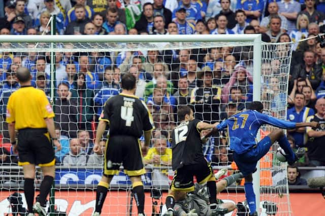Kanu nets the winner for Pompey. Picture: Allan Hutchings (082211-035)