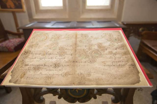 The original wedding certificate of the last royal wedding to take place in Portsmouth, confirming the marriage of Charles II and Catherine of Braganza in 1662 Picture: The National Museum of the Royal Navy/PA Wire