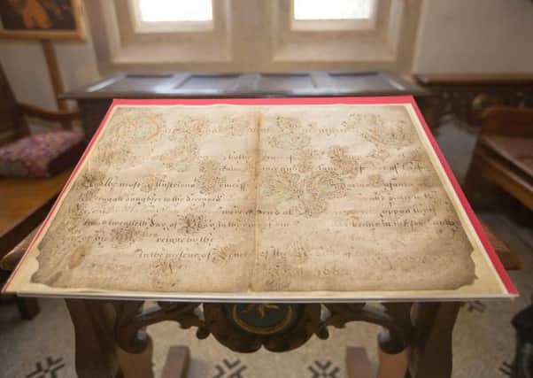 The original wedding certificate of the last royal wedding to take place in Portsmouth, confirming the marriage of Charles II and Catherine of Braganza in 1662 Picture: The National Museum of the Royal Navy/PA Wire