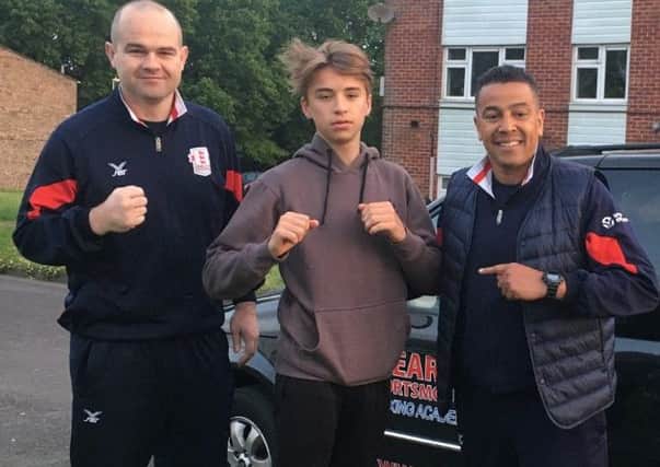 Sonny Driscoll, centre, with Heart of Portsmouth coaches Dave Johnston, left, and Q Shillingford