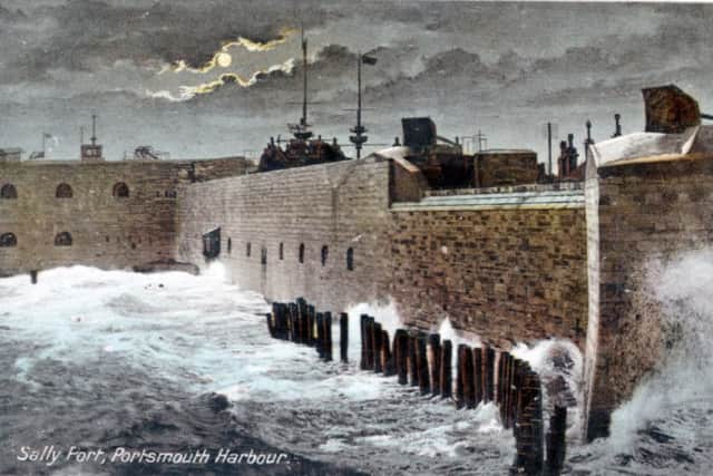 A romantic view of Sally Port on a stormy night at high tide. Picture: Barry Cox Collection