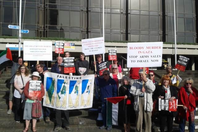 Campaigners at the Guildhall Square vigil. Credit: Penny Foskett