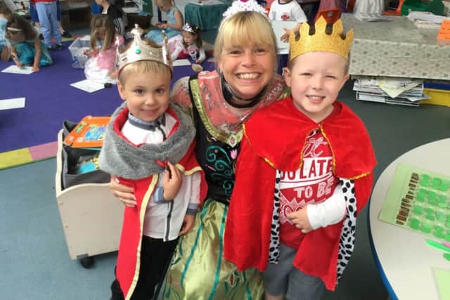 Newtown C of E Primary School teacher Mrs Halsey with Marcel Kolodziej and Lincoln Voller-Sutton. Picture: Newtown C of E