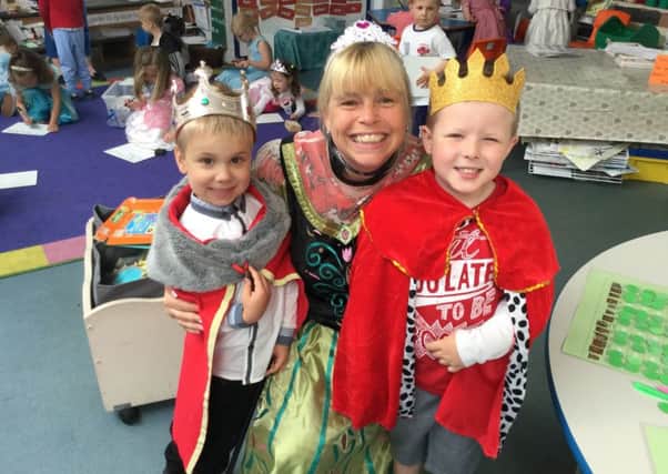 Newtown C of E Primary School teacher Mrs Halsey with Marcel Kolodziej and Lincoln Voller-Sutton. Picture: Newtown C of E