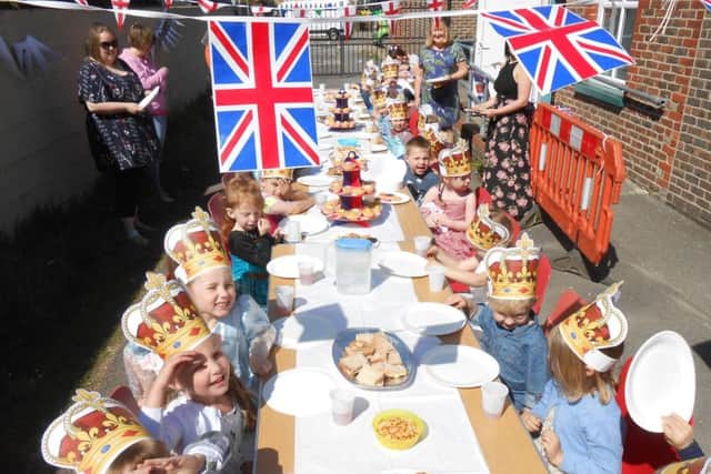 Pupils and staff at Deverell Hall Pre-School in Waterlooville enjoy a royal lunch. Credit: Deverell Hall