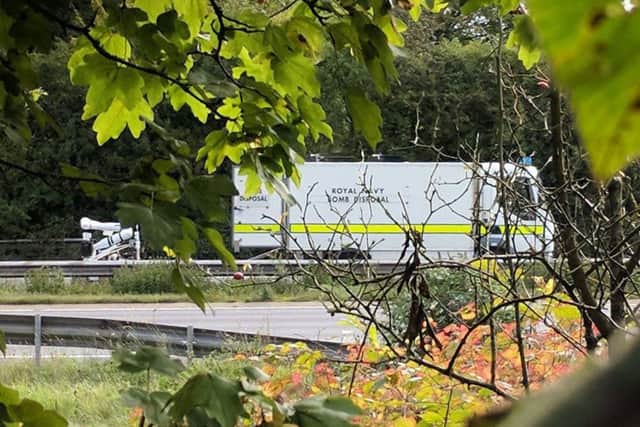 Handout photo taken with permission from the Twitter feed of Simon Read of a Royal Navy bomb disposal unit on the M3, after emergency services shut a section of the motorway, causing travel misery for thousands of motorists. Picture: Simon Read/Twitter/PA Wire