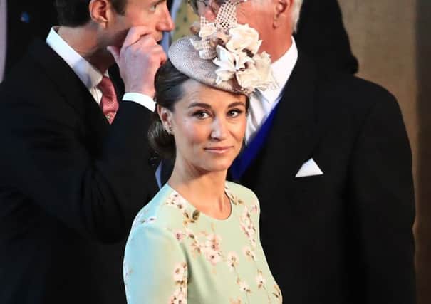 Pippa Middleton arrives in St George's Chapel at Windsor Castle for the wedding of Prince Harry and Meghan Markle. PRESS ASSOCIATION Photo. Picture date: Saturday May 19, 2018. See PA story ROYAL Wedding. Photo credit should read: Danny Lawson/PA Wire ROYAL_Wedding_102924.JPG