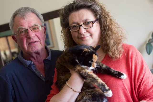 Flame with her owners, Rhianon and Bob Gallagher Picture Duncan Shepherd