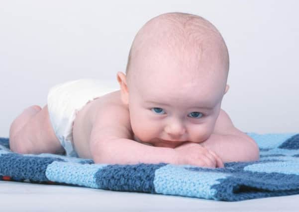 Clive says it's ridiculous to ask a baby for permission to change its nappy Credit: PA