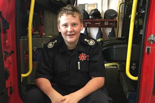 Andrew Impey rides again and raises funds for fire charity