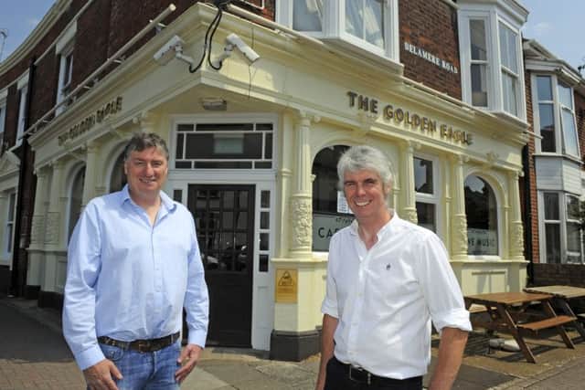 Vince Barnes, left, and Phil Estell at The Golden Eagle pub on the corner of Fawcett Road and Delamere Road in Southsea   Picture:  Malcolm Wells (180523-9890)