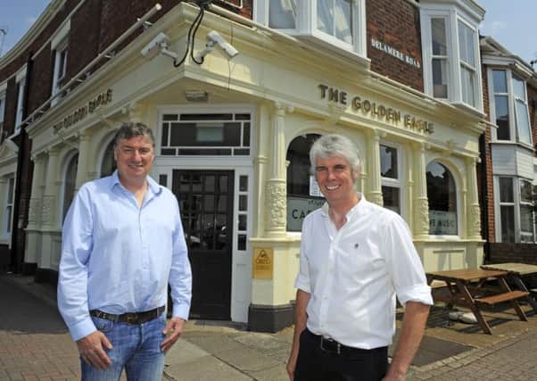 Vince Barnes, left, and Phil Estell at The Golden Eagle pub on the corner of Fawcett Road and Delamere Road in Southsea   
Picture:  Malcolm Wells (180523-9890)