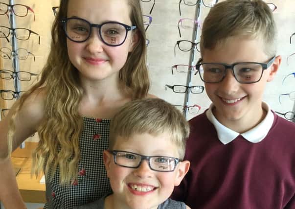Childrens glasses at Tombs and Allen. Connie Sargent, Bradley Goldsmith and Morgan Creasey