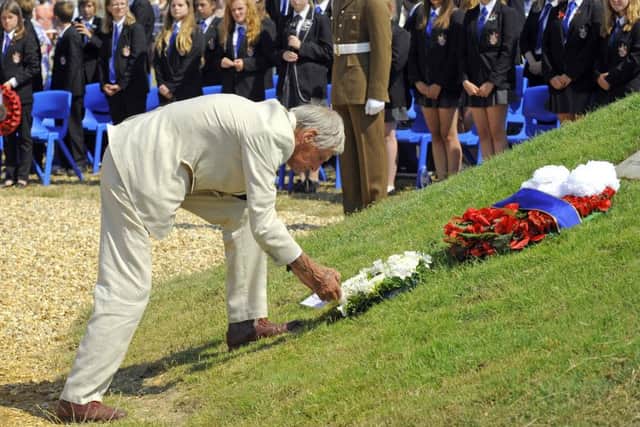 COPP survivor Jim Booth lays a wreath on The COPP Memorial on Hayling Island in 2015. Picture: Malcolm Wells